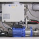 Internal Arrangement Showing Main Pump and Spray Lance Pump Under the Control Panel