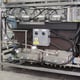 Front View of Machine with Panel Removed Showing the Temperature Controllers
