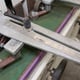 Close Up of Adjustable Guide Wheels and Scale reading