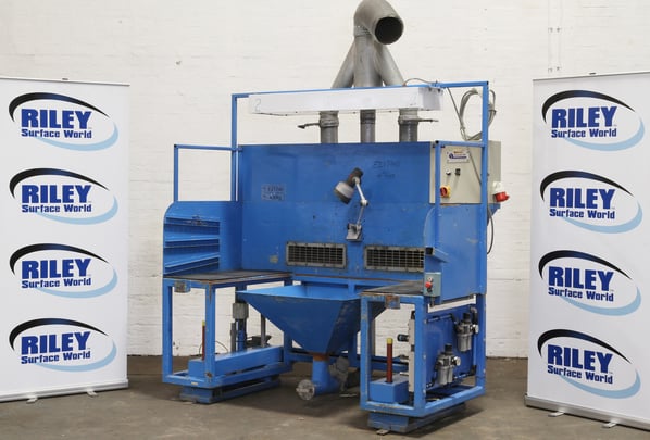 Powered Adjustable Height Fettling Bench with Lighting and Dust Extraction.
